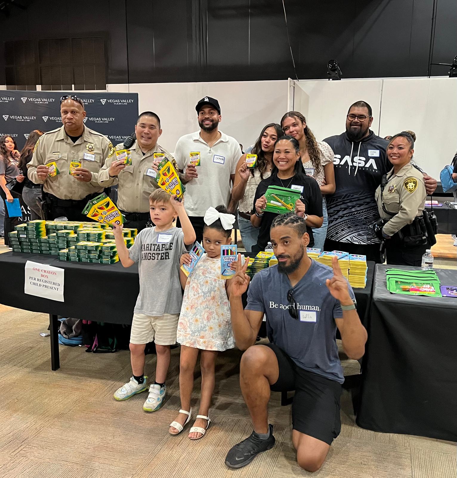 Pack the Mack 2025 &mdash; Students Receiving Backpacks